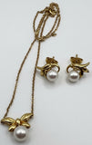 18ct gold Mikimoto pearl earrings and necklace